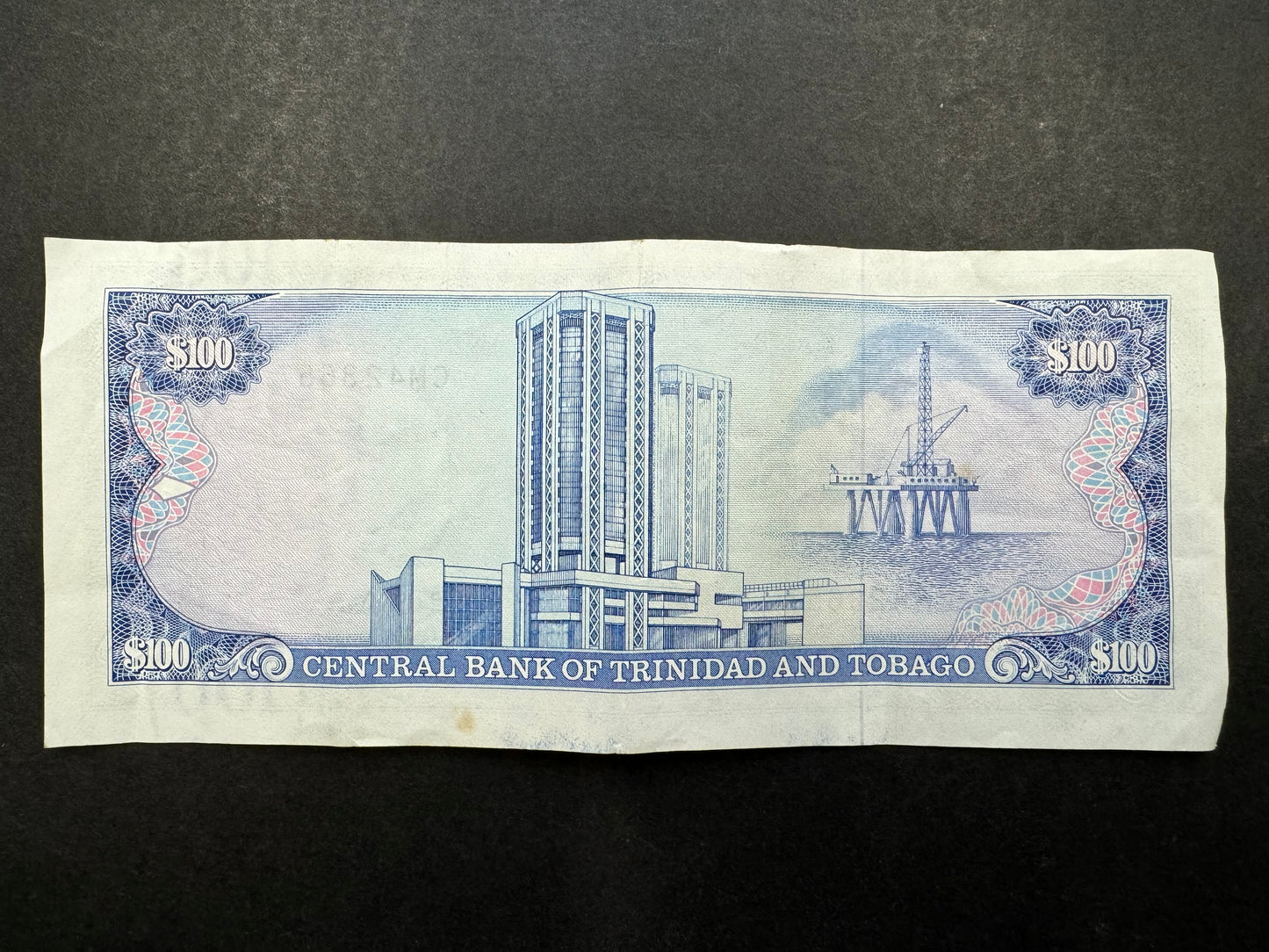 Rare $100 Dollars Banknote From Trinidad & Tobago (Issued in 1985)