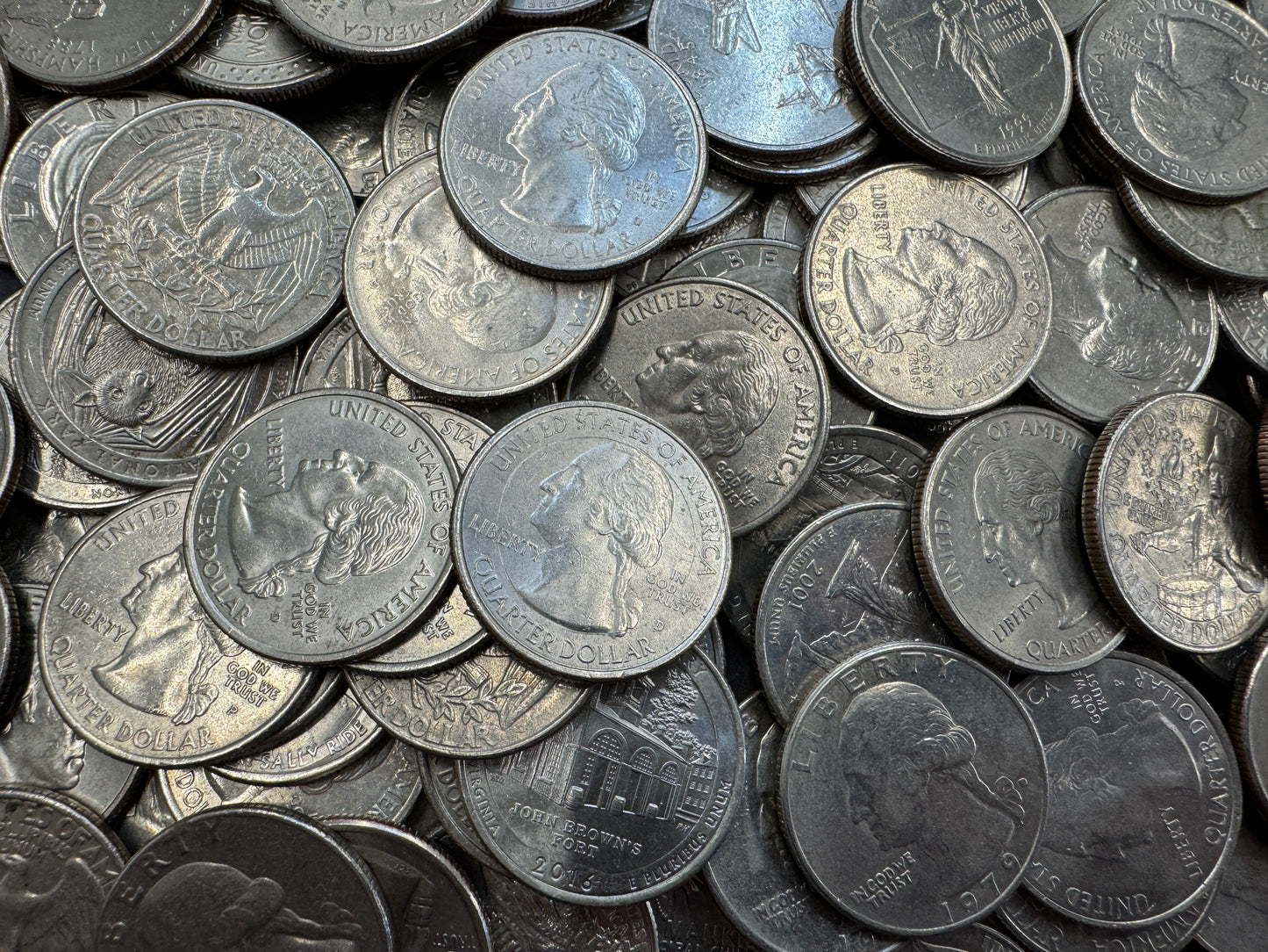 25 Cent Quarters With Various Designs From The United States (Various Years)