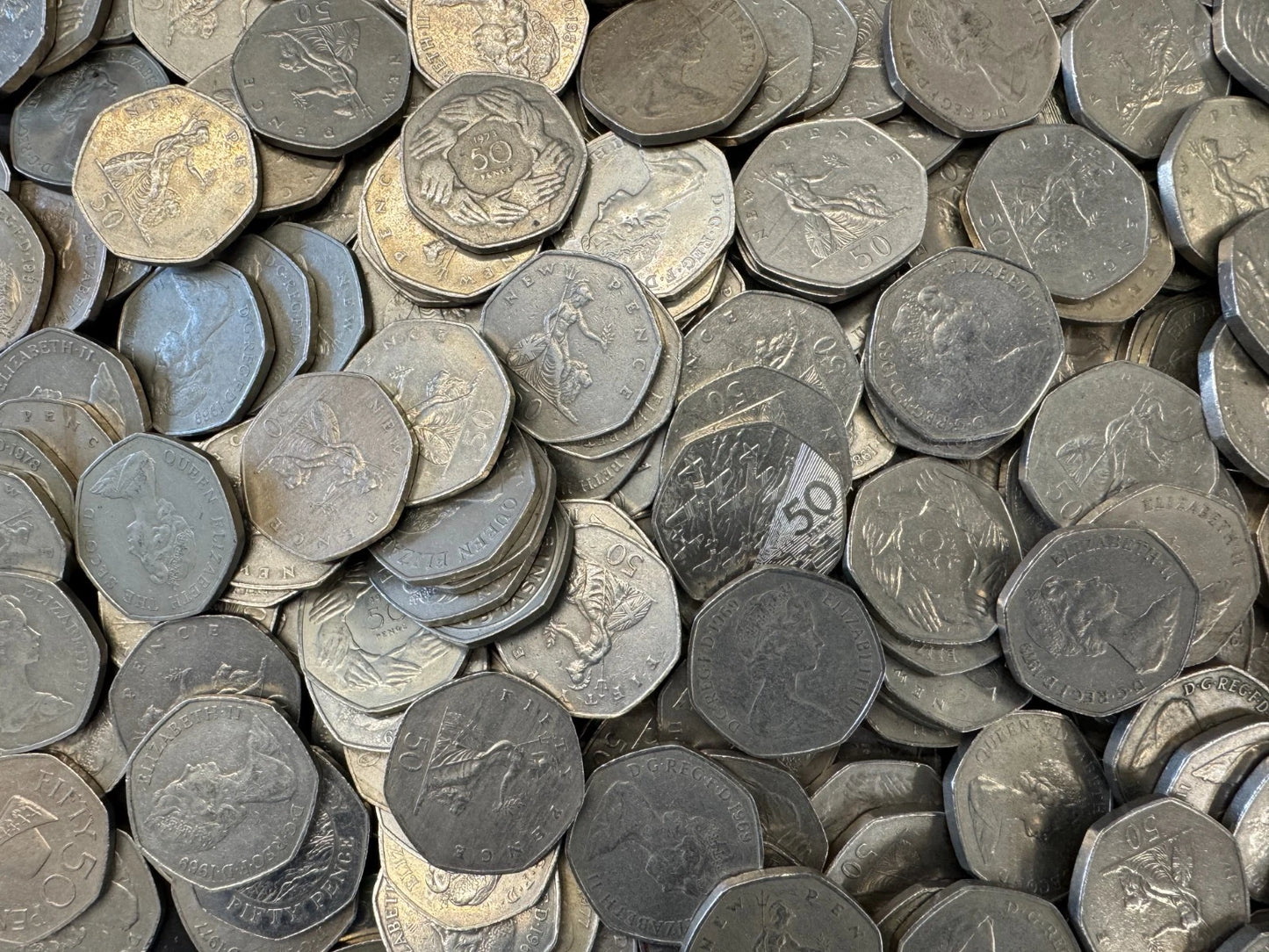 10 Old 50 Pence Coins From The United Kingdom